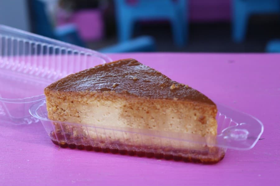 The dessert menu includes coconut- and caramel-flavored flan. (Adriana Rezal/Community Impact Newspaper)