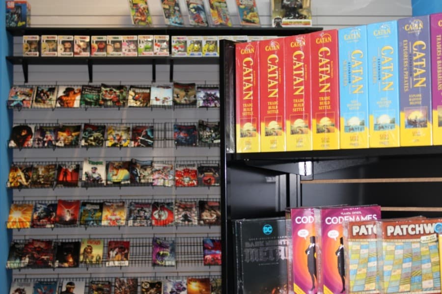 Comix Cafe offers a selection of table-top games and comic books, among other merchandise. (Adriana Rezal/Community Impact Newspaper)