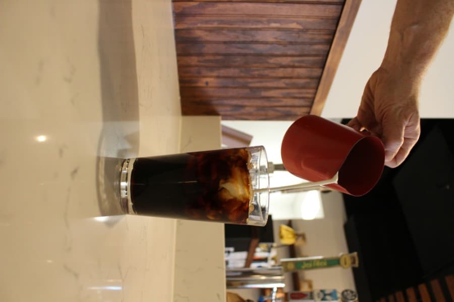Honeylu's cold brew is served with nitrogen gas, which creates small ripples in the drink. (Francesca D'Annunzio/Community Impact Newspaper)