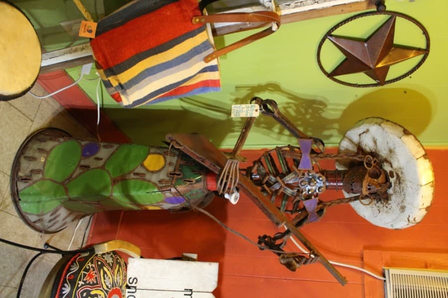 Collins said she doesn’t have a favorite piece in the store at the moment, but she showed great affection for a Mexican metal sculpture of a cactus skeleton lady named Katrina, who hails from San Miguel de Allende, Mexico. (Francesca D'Annunzio/Community Impact Newspaper)