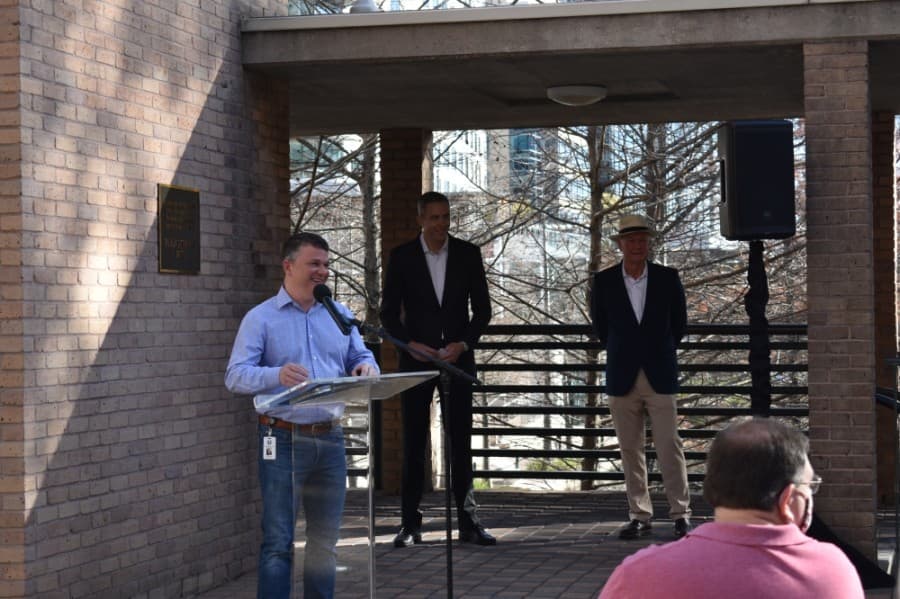 From left, Montgomery County Precinct 3 Commissioner James Noack was joined by Jim Carman, Houston Region president of The Howard Hughes Corp.; and Alex Sutton, former co-president of The Woodlands Development Company, at the bridge ceremony. (Vanessa Holt/Community Impact Newspaper)