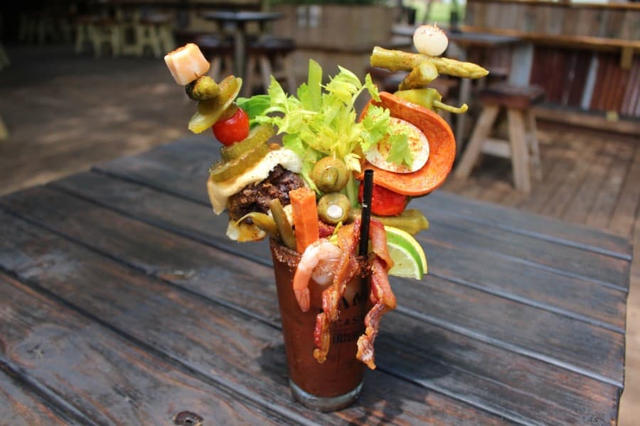 Homemade bloody marys are served with stacked ingredients. The Ultimate Bloody Mary costs $21-$23 based on the vodka type. (Kelly Schafler/Community Impact Newspaper) 