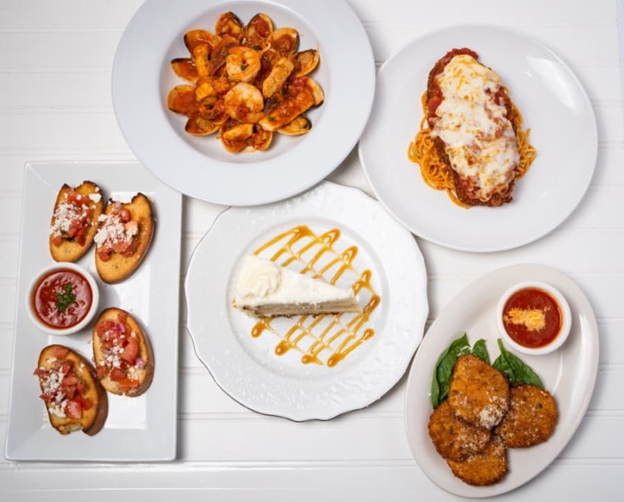 Trattoria Pizza & Pasta serves dishes such as firebrick oven-baked pizzas, shrimp modo mio and the tour of Italy, which invites diners to try classics including an eight-layer lasagna, chicken Alfredo. (Courtesy Trattoria Pizza & Pasta)