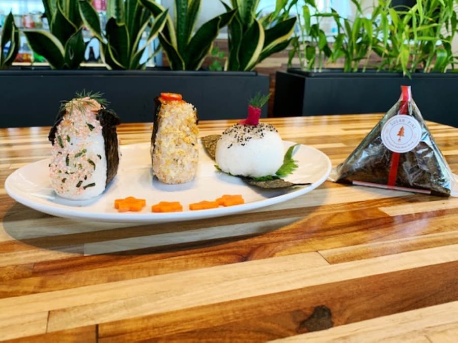 Onigiri is offered both for in-house and to-go dining in traditional packaging at Sugar Pine. (Greg Perliski/Community Impact Newspaper)