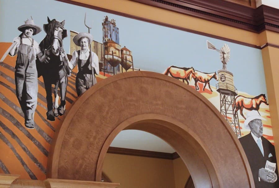 This mural showcases Grapevine's famous landmarks, including B&D Mills in the background. (Sandra Sadek/Community Impact Newspaper)