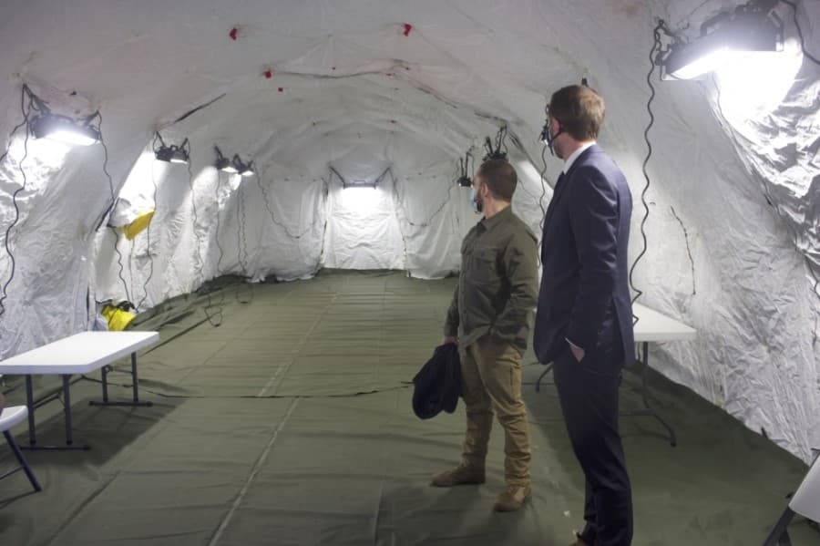 Photo of Andy Brown touring a treatment space