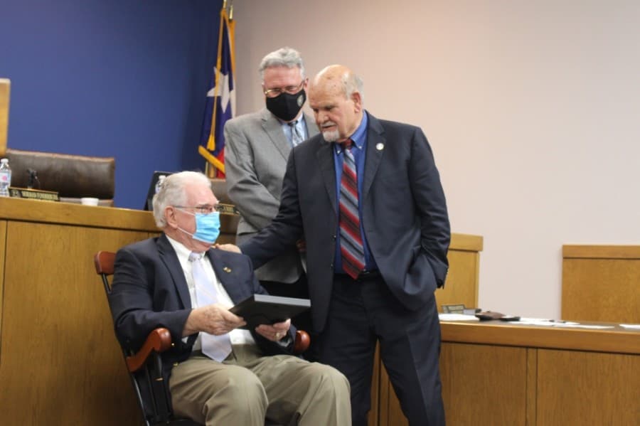 Humble City Council Member Allan Steagall, left, who served on council for 18 years, officially retired Jan. 14. Council members, city officials and Mayor Merle Aaron, right, thanked Steagall for his commitment to the community. (Kelly Schafler/Community Impact Newspaper)