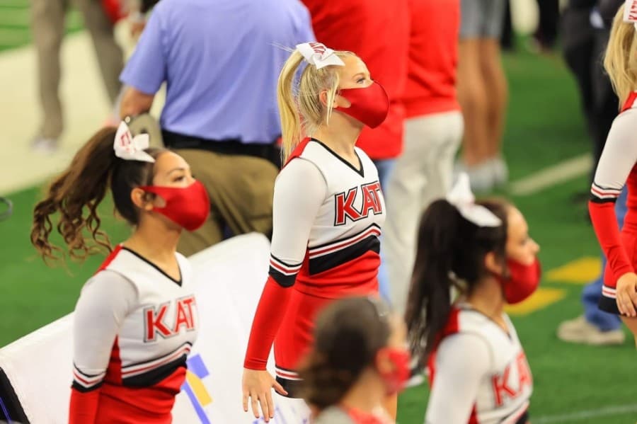 Baylea Gammel, middle, cheers as the Katy High School Tigers compete in the state championship game Jan. 16. (Courtesy Rams Reyna)