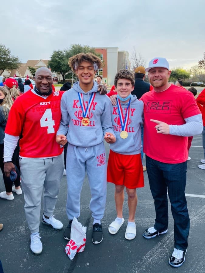From left: Rod Anderson; Nic Anderson, No. 4, son of Rod; Caleb Koger, No. 10; Jeremy Koger, father of Caleb. (Courtesy Dana Congleton Koger)