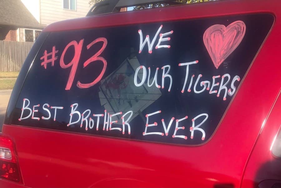 This car is painted to show support for Broderick Johnson, a sophomore Katy High School football player. Johnson's sisters, Brooklyn, Bentley and Bristol, painted the car. (Courtesy Audrey Riffel-Johnson)