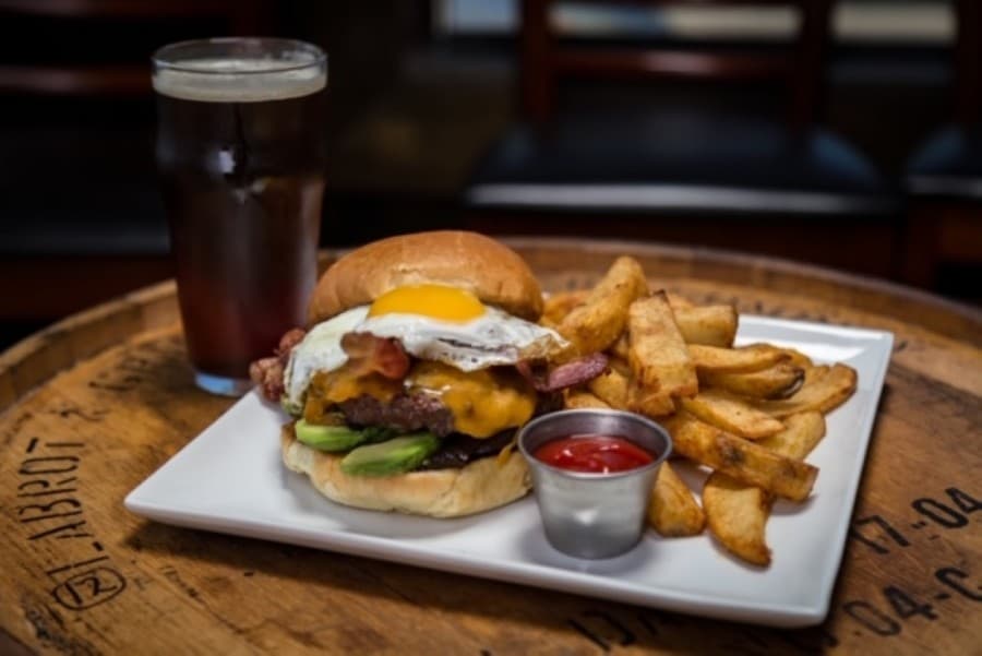 J. Henry’s Draught House + Kitchen: Family-style eatery offers rotating craft beer selection with crowd-pleasing dishes