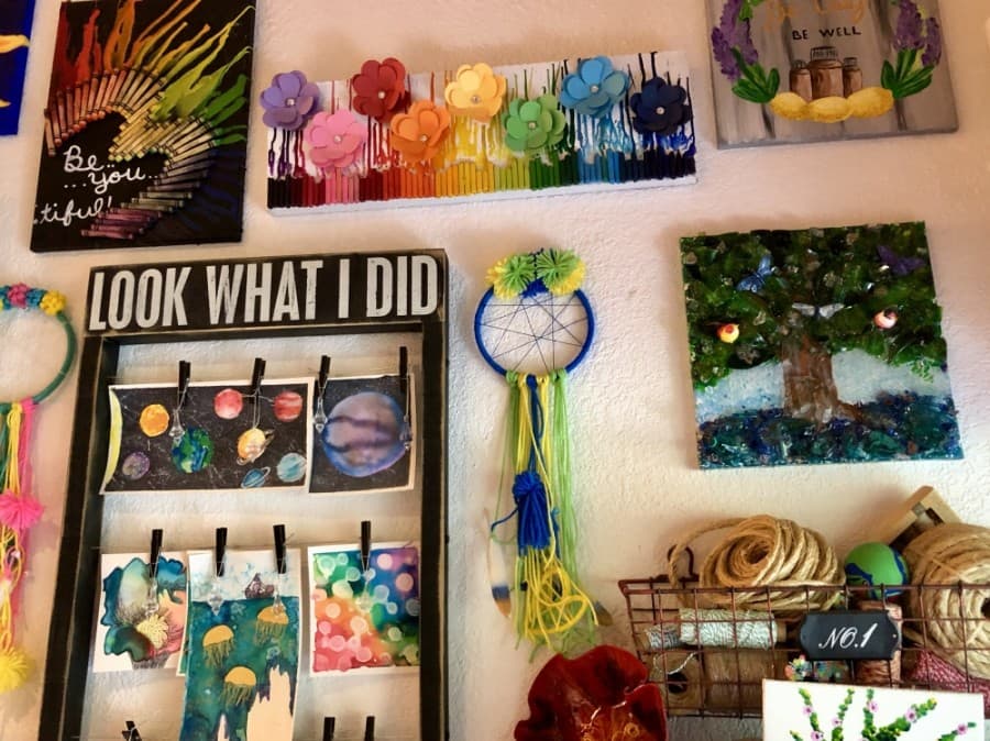 Projects cover the walls at Art Barn ATX. (Sally Grace Holtgrieve/Community Impact Newspaper)