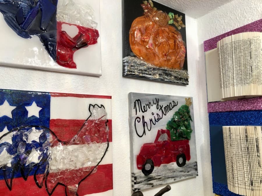 Projects cover the walls at Art Barn ATX. (Sally Grace Holtgrieve/Community Impact Newspaper)