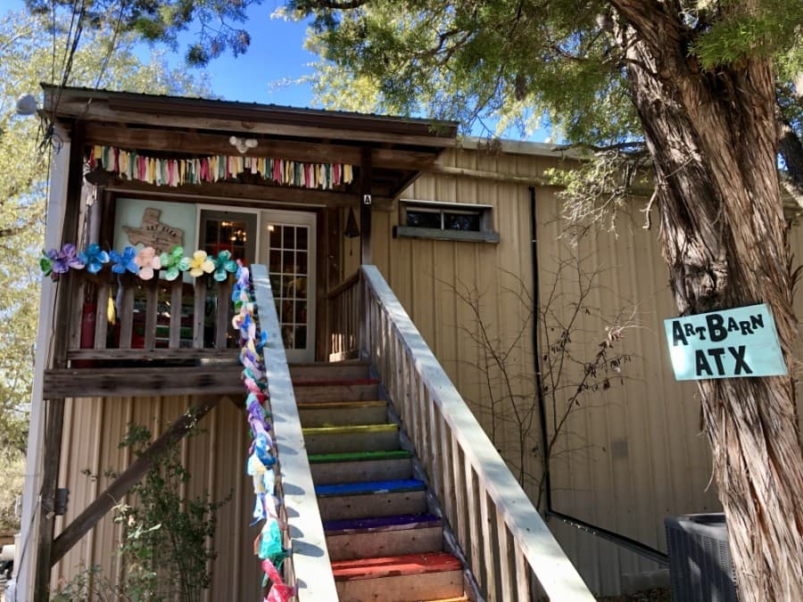 Art Barn ATX sits atop a hill overlooking Lake Travis. (Sally Grace Holtgrieve/Community Impact Newspaper)