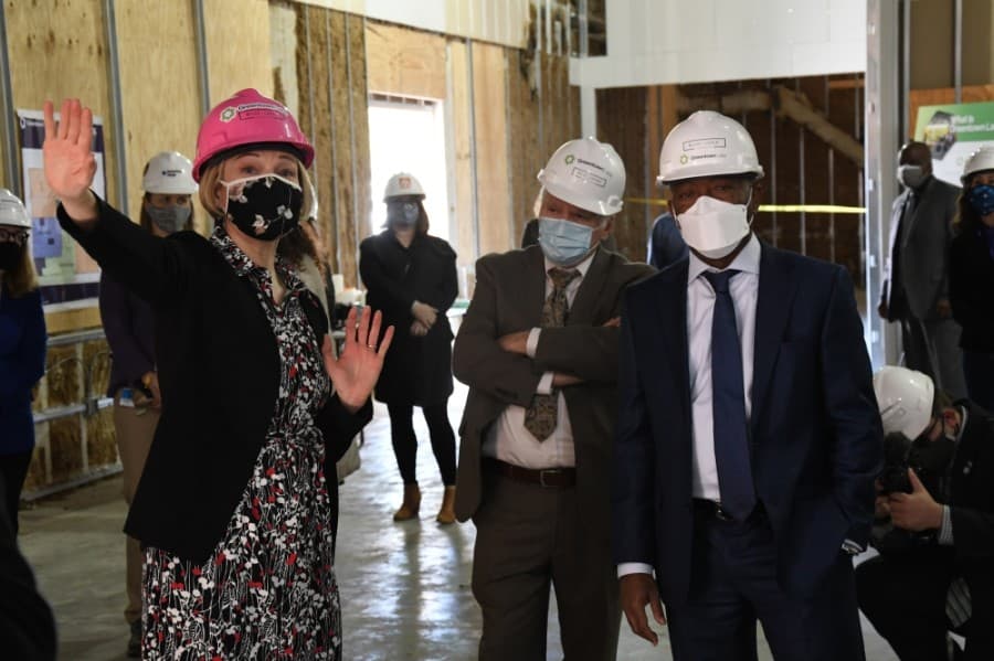 Greentown Labs CEO Dr. Emily Reichert gives Houston Mayor Sylvester Turner a tour of the interior of its future incubator expected to open in late April. (Hunter Marrow/Community Impact Newspaper)