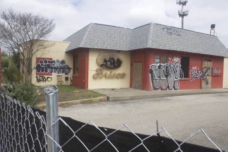 The property at 6801 Burnet Road, formerly the site of the Frisco Shop, will become a multifamily apartment complex according to permit applications filed by developer Oden Hughes. (Jack Flagler/Community Impact Newspaper) 