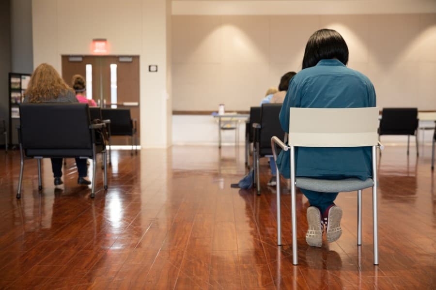 people in chairs