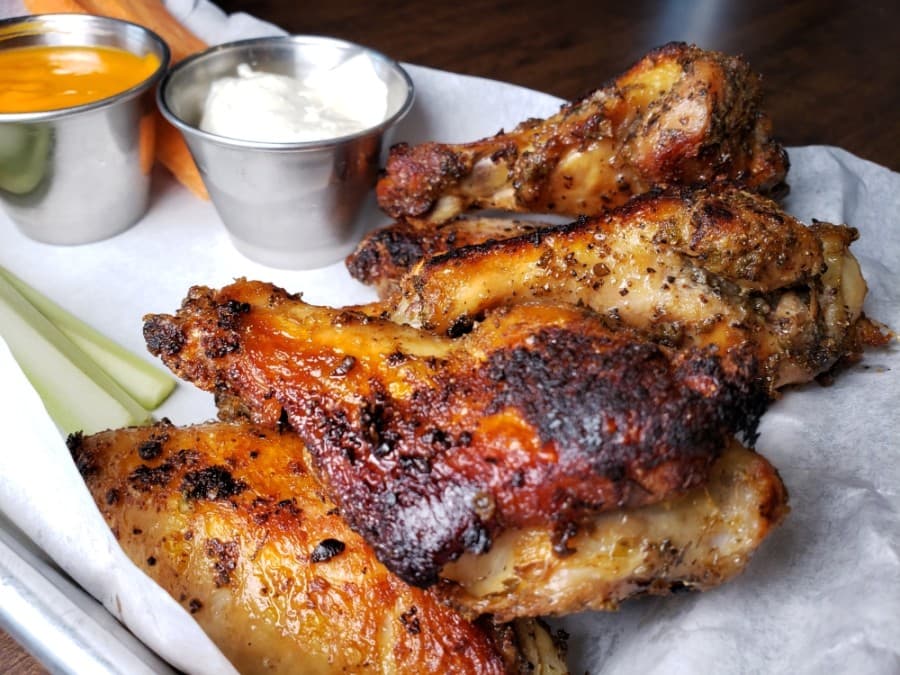 Carrots and celery sticks, with honey garlic or original hot sauce. Choice of ‘shed-made ranch or bleu cheese. Price is $12.50. (Courtesy Watershed)