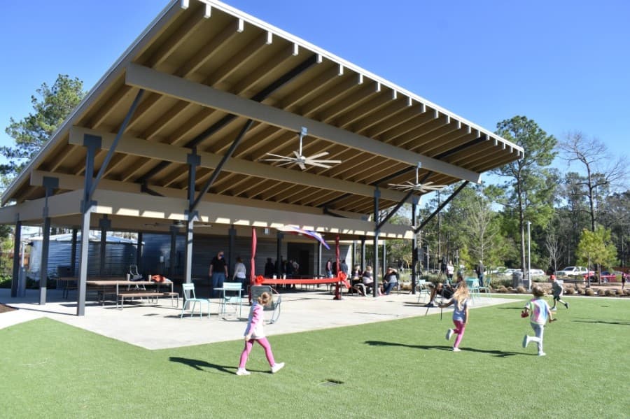A large covered pavilion at Pine Cove Park includes rest rooms and a shady area for picnics. (Vanessa Holt/Community Impact Newspaper)