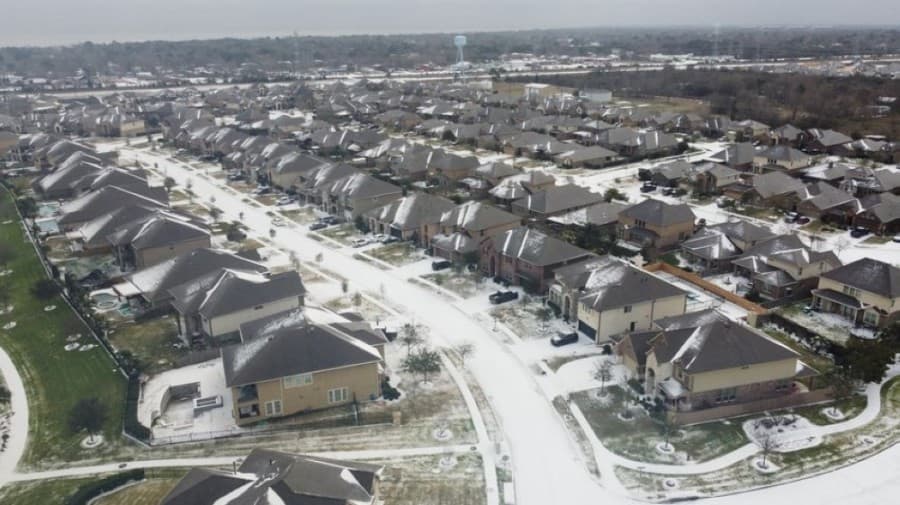 Streets of the MarBella neighborhood are snowy, as seen from above the morning of Feb. 15. (Courtesy Rico Daniels)