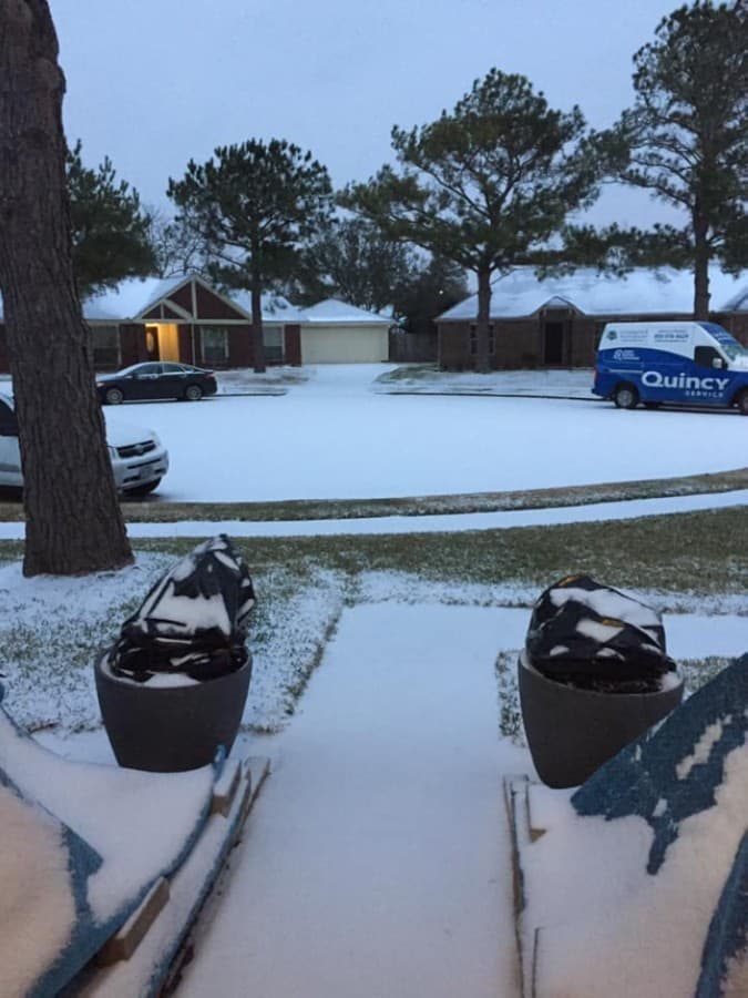 Snow accumulated in front yards throughout Sugar Land and Missouri City. (Courtesy Cristina Cespedes Zita)