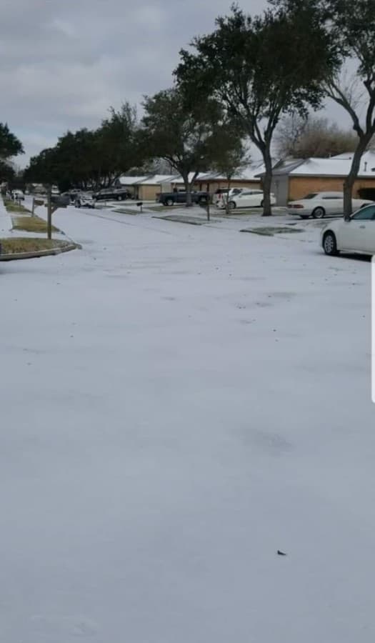 Streets and parking lots were covered in snow Feb. 15. (Courtesy Kelly Vela) 