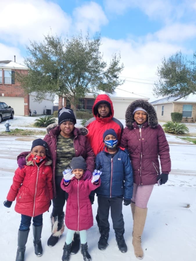 Sugar Land and Missouri City residents bundled up to play in snow. (Courtesy Frannie Fola) 
