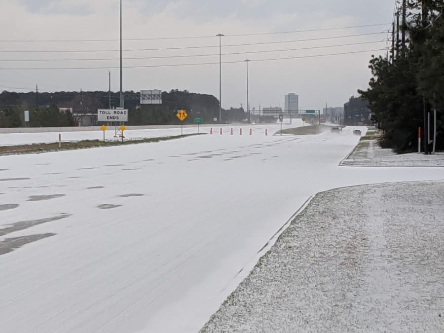 Hwy. 249 was covered with ice and snow early Feb. 15. (Anna Lotz/Community Impact Newspaper)