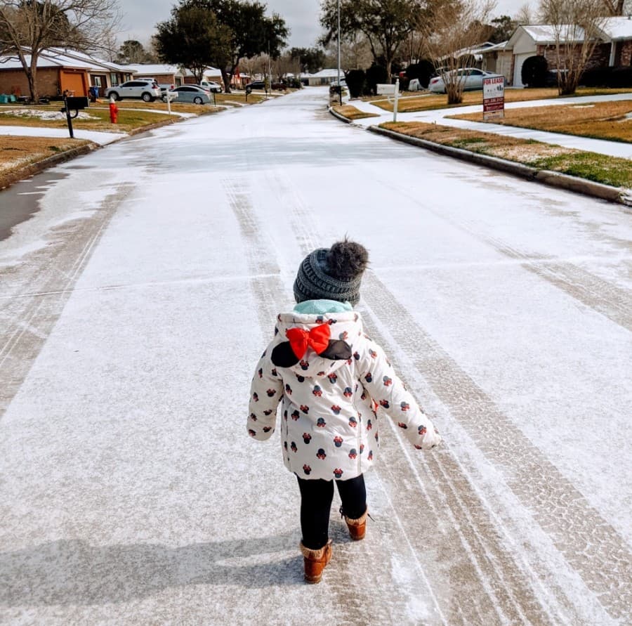Dylan Carey, age 2, enjoys a snow day in Friendswood's Forest Bend neighborhood. (Courtesy Devin Eppolito) 
