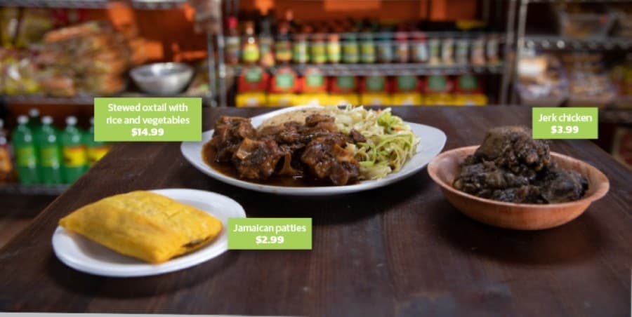 Traditional Caribbean dishes, such as jerk chicken, are among customer favorites. (Liesbeth Powers/Community Impact Newspaper)
