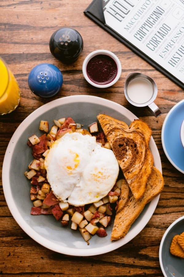 Corned beef hash ($12.25) is served with eggs. (Courtesy Layered)