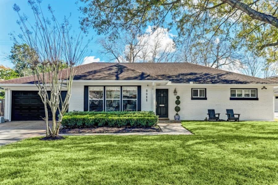8811 Linkmeadow Lane, Houston: Located in the quiet neighborhood of Linkwood, this ranch-style home features updates throughout including hardwood floors in all living areas and bedrooms, a fully renovated kitchen with wine storage and custom glass shelving, renovated bathrooms, a wet bar, an air conditioning system updated in 2017, furnaces and air ducts. 3 bed, 2 full baths/2,077 sq. ft. Sold for $482,001-$552,000 on Feb. 23. (Courtesy Houston Association of Realtors)