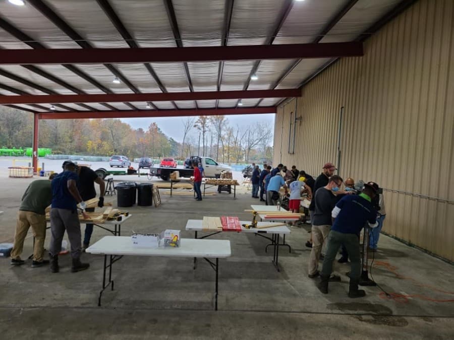 Volunteers work together to build beds for local children. (Courtesy Sleep in Heavenly Peace-Spring Cypress)
