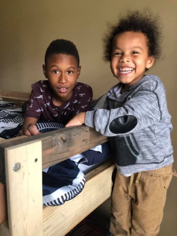 Once constructed, volunteers deliver beds to local children in need. (Courtesy Sleep in Heavenly Peace-Spring Cypress)