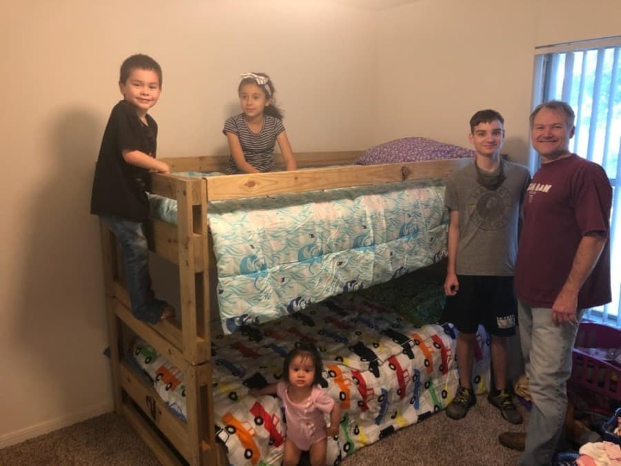 Once constructed, volunteers deliver beds to local children in need. (Courtesy Sleep in Heavenly Peace-Spring Cypress)
