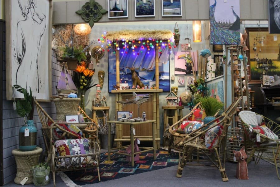 A display at the Antique Gallery of Lewisville features a model shark and other furniture and decorative items. (Daniel Houston/Community Impact Newspaper)