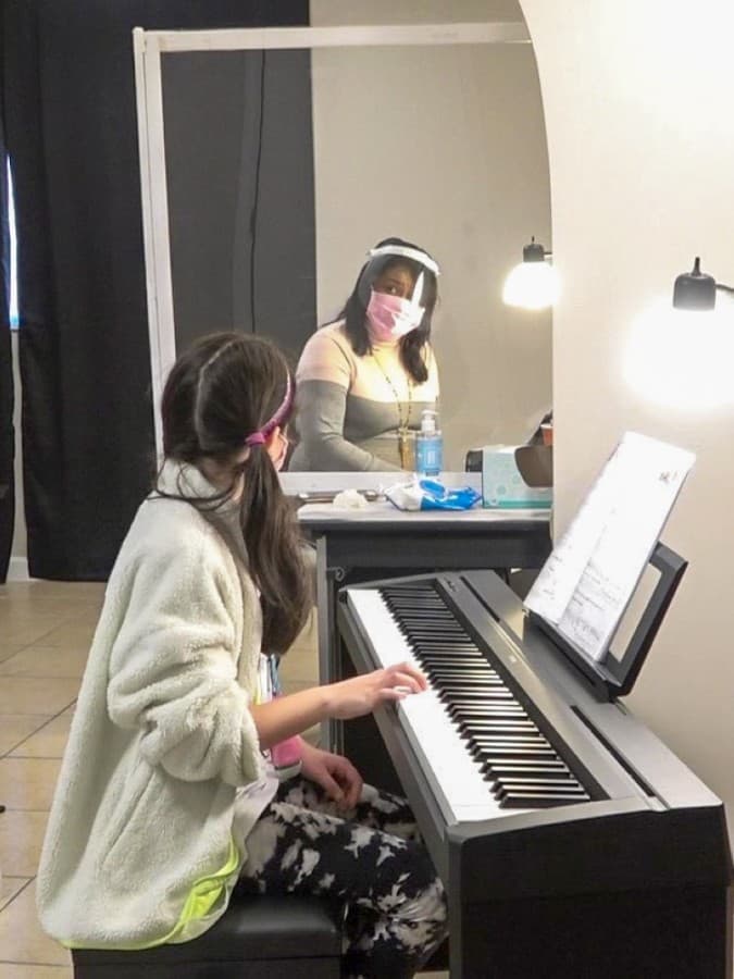 The school only schedules one lesson at a time, sanitizes between lessons, and strongly enforces the use of face masks. (Courtesy Allegro Violin School)