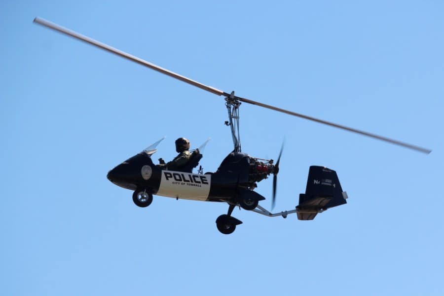 In commemoration of Rob Hauck’s legacy, the city retired Michael One’s tail number—the city's gyrocopter—following a flyover at the March 19 memorial service. (Anna Lotz/Community Impact Newspaper)