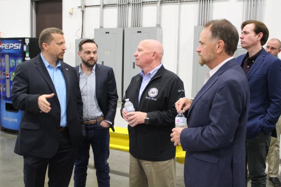 Brady and Toth begin their tour of the Wildcat PPE facility. (Andrew Christman/Community Impact Newspaper)