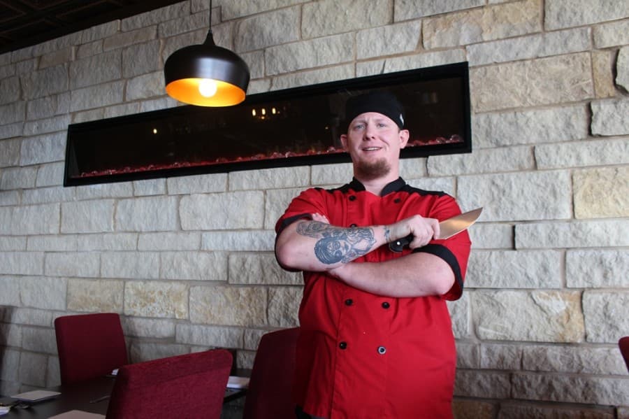 Phillip White works under Tony Nicoletta as the chef of Prime 101 Steakhouse. (Eva Vigh/Community Impact Newspaper)
