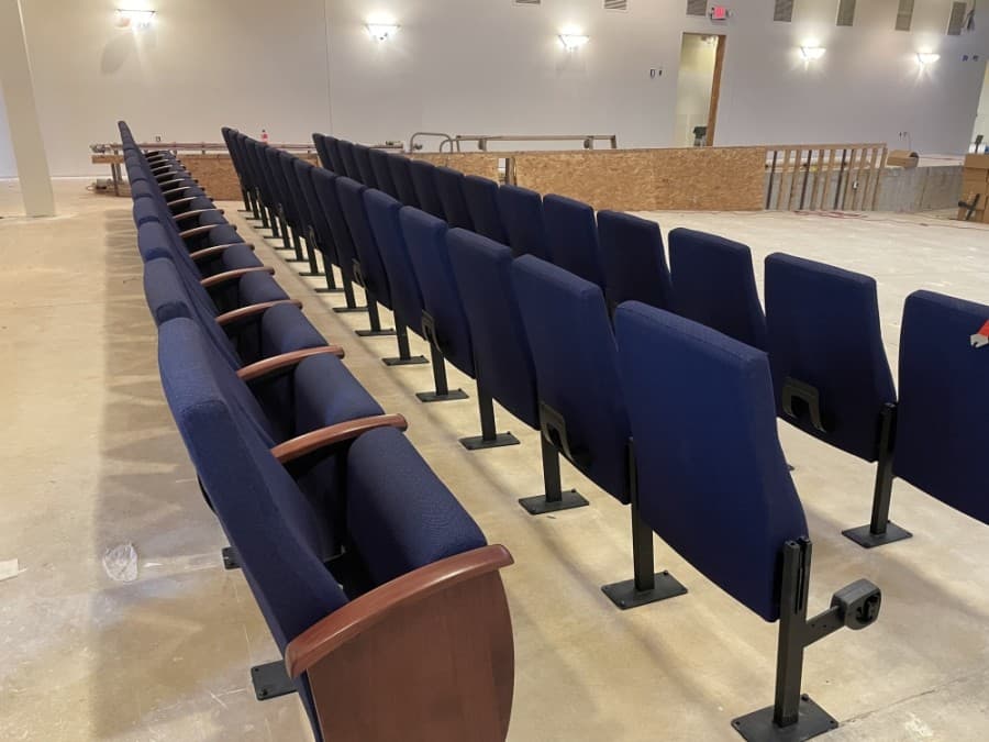 Theater seat installation began in mid-March at The Centrum. Upon completion, the venue will be able to seat 897 people. (Hannah Zedaker/Community Impact Newspaper)