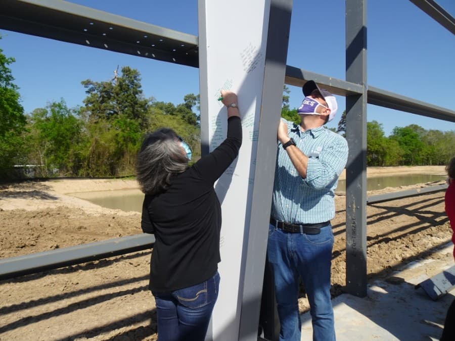 Cypress Assistance Ministries celebrates milestone in new facility construction process