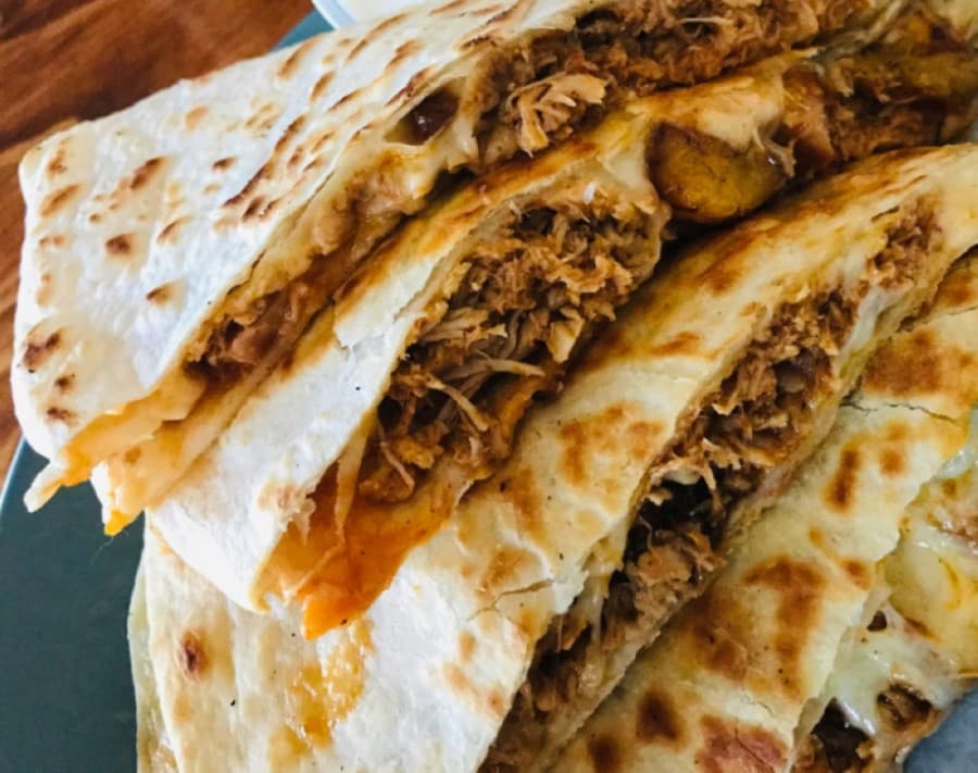 The restaurant’s King Size Quesadilla ($9.50) can come filled with pulled pork, pulled chicken, ground beef or veggies. (Courtesy Boca 31)