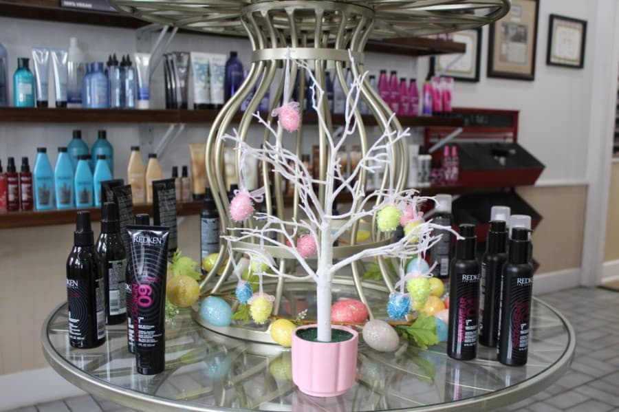 Customers can pick an egg ornament off of a mini tree at The Studio to unlock a deal for their purchase April 2-3. (Megan Cardona/Community Impact Newspaper)