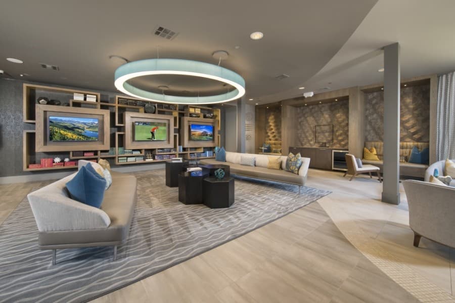 Among The Mark's amenities is a large social lounge with billiards, multiple flat panel televisions and a coffee bar. (Courtesy Public Content)