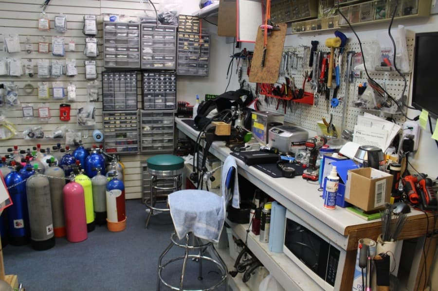 The diving center includes a workshop for repairs to customers' diving equipment. (Ben Thompson/Community Impact Newspaper)
