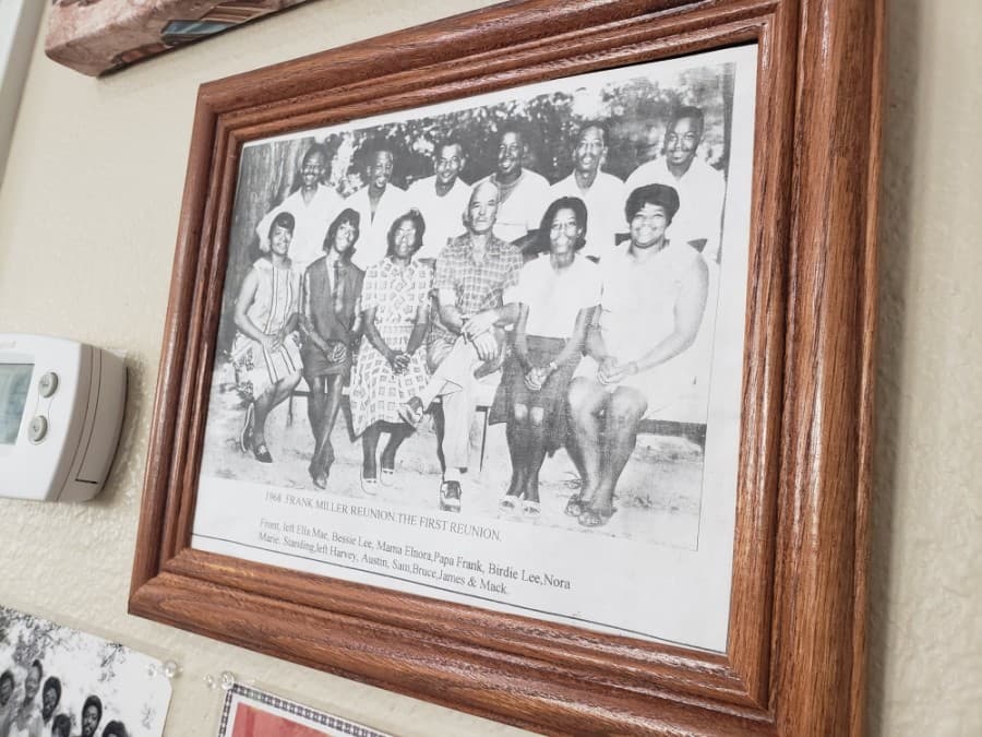 Photo: Frank Miller (center) was the father of 10 children including Nik Shanklin’s grandmother Birdie Lee Shanklin (second from right). (Ali Linan/Community Impact Newspaper)