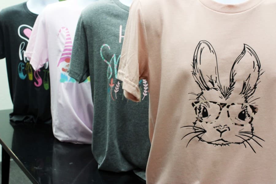 These shirts at My Vinyl Craft have heat transfer vinyl designs.