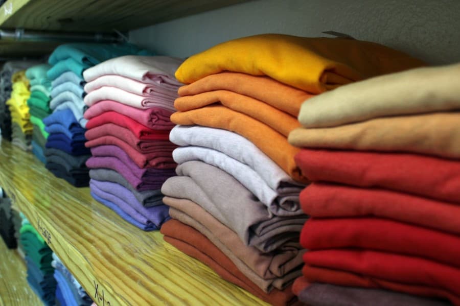 Bella Canvas shirts ($6 each) are popular with customers because of their softness.  
