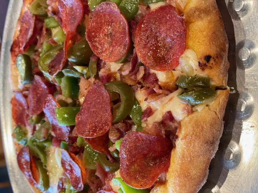 The Pizza Nick ($3) comes with pepperoni, bacon, bell peppers, onions, jalapenos and mozzarella cheese. (Courtesy Raymond Green)
